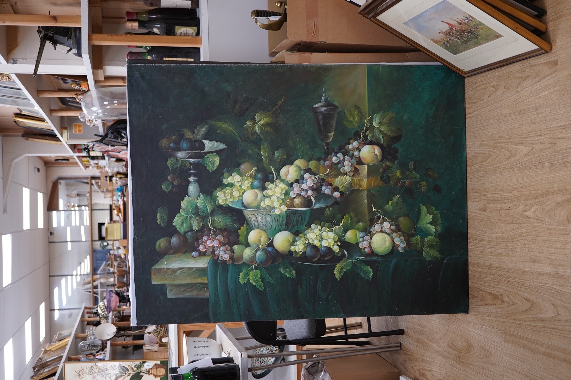 20th century, Dutch style, set of three oils on canvas, still life scenes of flowers and fruit, unsigned, each 92 x 121cm, unframed. Condition - fair